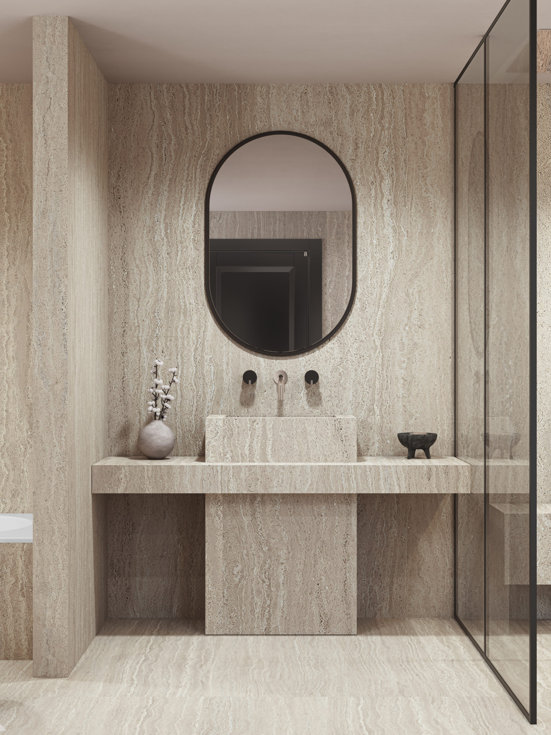 Salle de bain en travertin avec robinetterie en chrome. Travertin bathroom with chrome bathroom fittings.